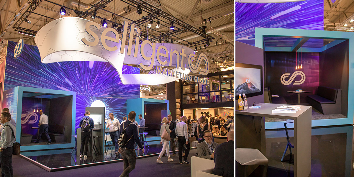 Beleuchtete Messestände ziehen alle Blicke auf sich, das zeigte unter anderem der Kopfstand von Selligent